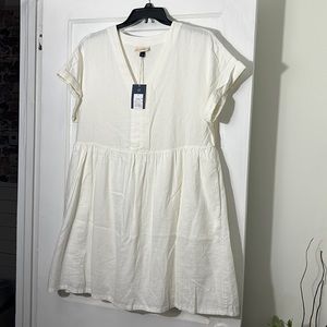 Women’s white linen mini dress with pockets